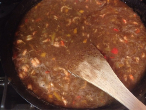 6. 😃 Yayes! If you did it right, yours is either this dark or even darker without being burnt. Serve over rice with green onions & hot sauce - don't you dare eat this without hot sauce!